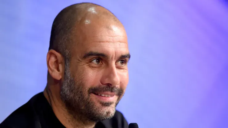 MUNICH, GERMANY – APRIL 20: Head coach Josep Guardiola looks on during a press conference prior to their UEFA Champions League Quarter Final second leg match at Allianz Arena on April 20, 2015 in Munich, Germany. (Photo by Lars Baron/Bongarts/Getty Images,)

