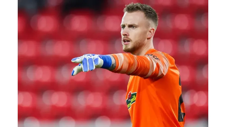 Freiburg goalkeeper Mark Flekken gestures against Hoffenheim. (Photo by Tom Weller/picture alliance via Getty Images)