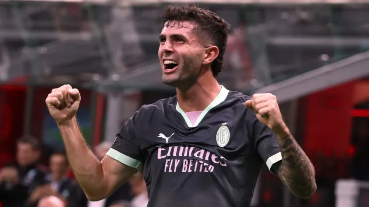 Christian Pulisic of AC Milan celebrates after scoring a goal.
