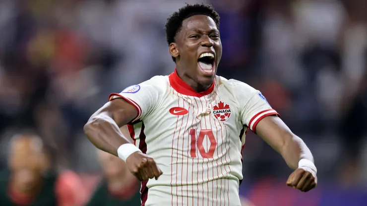 Jonathan David of Canada celebrates after winning a game.
