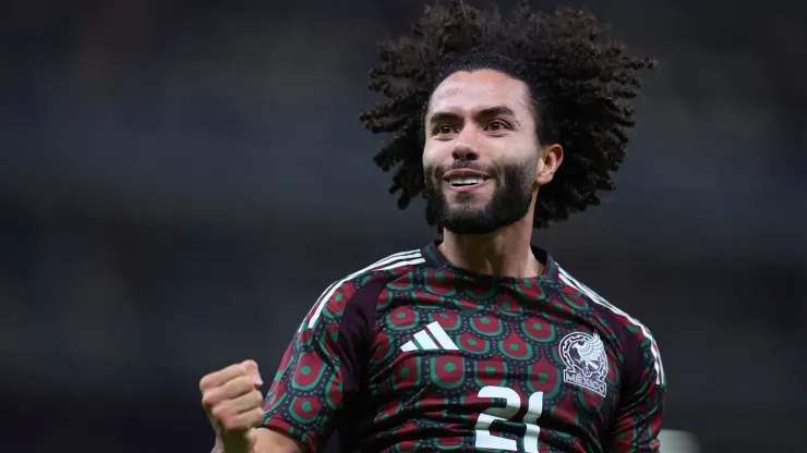 Cesar Huerta of Mexico celebrates after scoring a team's goal.
