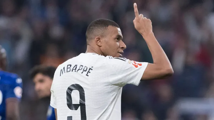 Real Madrid vs Getafe MADRID, SPAIN – December 1: Kylian Mbappe of Real Madrid celebrates a goal during the La Liga 2024 25 match between Real Madrid and Getafe at Santiago Bernabeu Stadium. 
