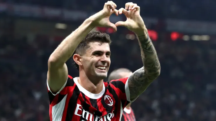  Christian Pulisic of AC Milan celebrates scoring his team's third goal during the Serie A match between AC Milan and US Lecce at Stadio Giuseppe Meazza on September 27, 2024 in Milan, Italy.
