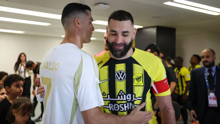 Cristiano Ronaldo of Al Nassr and Karim Benzema of Al Ittihad talk prior the Saudi Pro League match between Al-Ittihad v Al-Nassr at King Abdullah Sports City on December 6, 2024 in Jeddah, Saudi Arabia.
