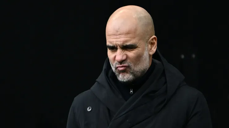 : Pep Guardiola, Manager of Manchester City, reacts during the Premier League match between Aston Villa FC and Manchester City FC at Villa Park on December 21, 2024 in Birmingham, England.
