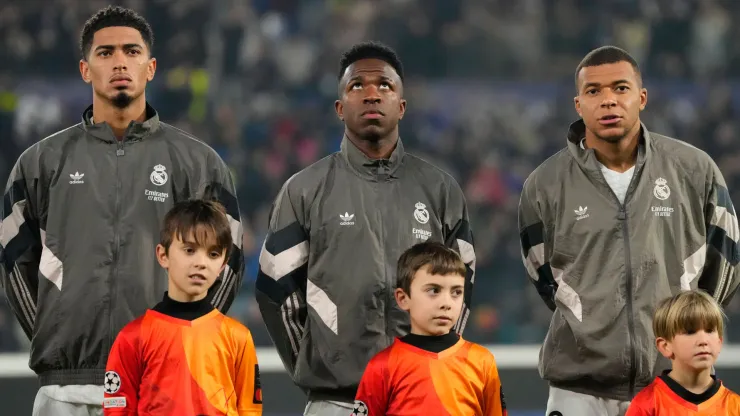 Jude Bellingham central midfield of Real Madrid and England, Vinicius Junior left winger of Real Madrid and Brazil and Kylian Mbappe centre-forward of Real Madrid and France during the UEFA Champions League 2024 25 League Phase MD6 match between Atalanta BC and Real Madrid C.F. at Stadio di Bergamo on December 10, 2024 in Bergamo, Italy. 
