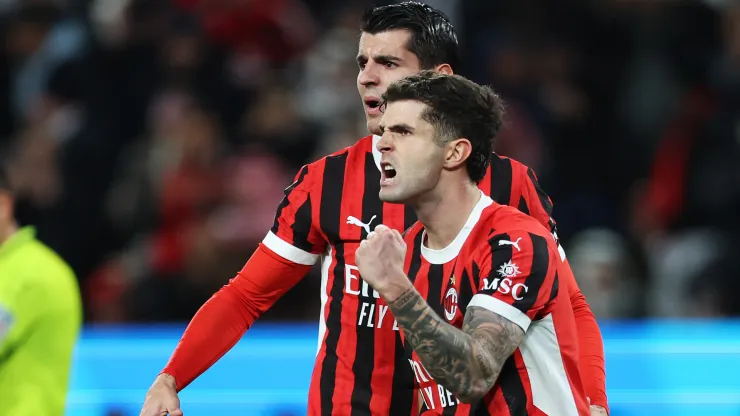 Christian Pulisic of AC Milan celebrates scoring his team's first goal from a penalty kick with teammate Alvaro Morata during the Italian Super Cup Semi-Final match between AC Milan and Juventus at Al Awwal Park on January 03, 2025 in Riyadh, Saudi Arabia.
