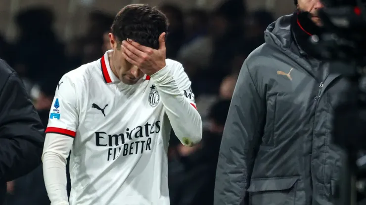  Christian Pulisic of AC Milan shows his dejection after his injury during the Serie A match between Atalanta and AC Milan at Gewiss Stadium on December 06, 2024 in Bergamo, Italy.
