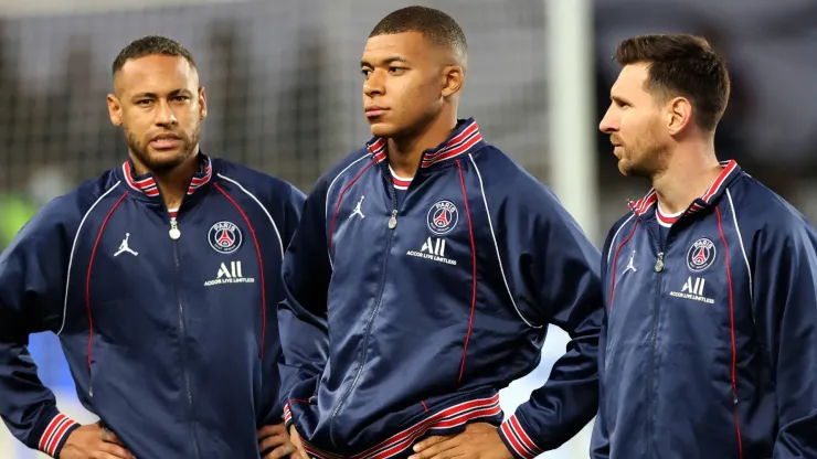 Paris Saint-Germain's Argentinian forward Lionel Messi, Neymar and Kylian Mbappe during the French L1 football match between Paris-Saint Germain (PSG) and Olympique Lyonnais at The Parc des Princes Stadium in Paris on September 19, 2021. 
