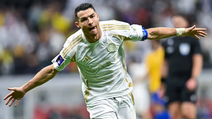 Cristiano Ronaldo of Al Nassr FC celebrates after scoring a goal during the AFC Champions League elite west football match between Qatar s Al Gharafa SC and Saudi Arabia s Al Nassr FC at Al-Bayt Stadium in Al Khor, Qatar, on November 25, 2024.
