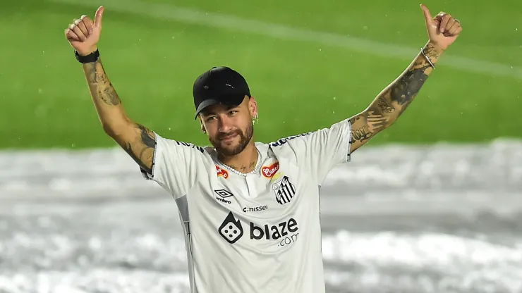  Neymar Jr. smiles during his unveiling as the new player of Santos at Urbano Caldeira Stadium (Vila Belmiro) on January 31, 2025 in Santos, Brazil. 
