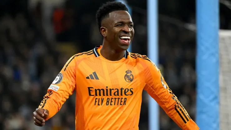Vinicius Junior of Real Madrid reacts during the UEFA Champions League 2024/25 League Knockout Play-off first leg match between Manchester City and Real Madrid C.F. at Manchester City Stadium on February 11, 2025 in Manchester, England. 

