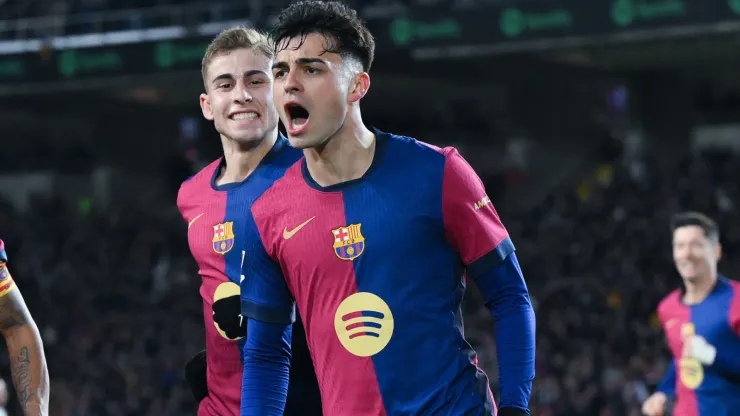 Pedri of FC Barcelona celebrates their team's first goal during the LaLiga match between FC Barcelona and Atletico de Madrid at Estadi Olimpic Lluis Companys on December 21, 2024 in Barcelona, Spain.
