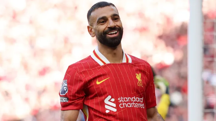 Mohamed Salah of Liverpool celebrates scoring his team's fourth goal during the Premier League match between Liverpool FC and Tottenham Hotspur FC at Anfield on April 27, 2025 in Liverpool, England.
