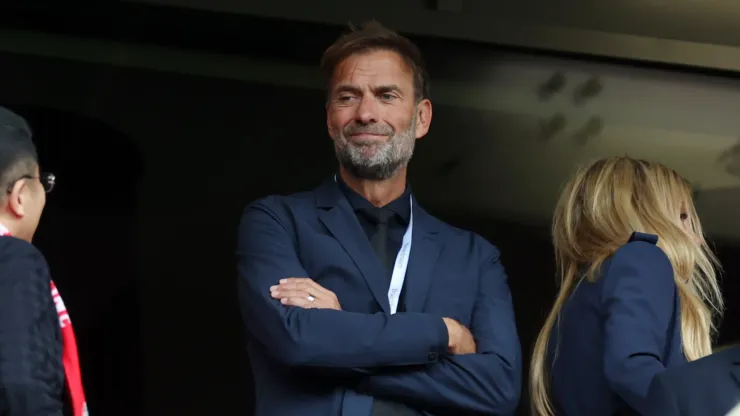 Former Liverpool Manager and current Head of Global Soccer for Red Bull GmbH Juergen Klopp looks on from an executive box prior to the Premier League match between Liverpool FC and Crystal Palace FC at Anfield on May 25, 2025 in Liverpool, England.
