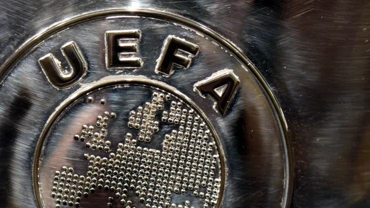 The UEFA logo is seen on the UEFA Champions League trophy as it is prepared for the UEFA 2014/15 Champions League third qualifying rounds draw at the UEFA headquarters, The House of European Football, on July 18, 2014 in Nyon, Switzerland.
