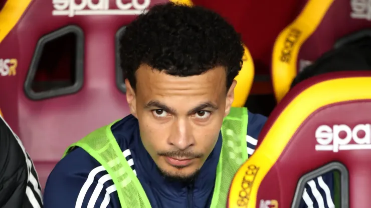 Dele Alli of Como looks on from the bench during the Serie A match between AS Roma and Como at Stadio Olimpico on March 02, 2025 in Rome, Italy. 
