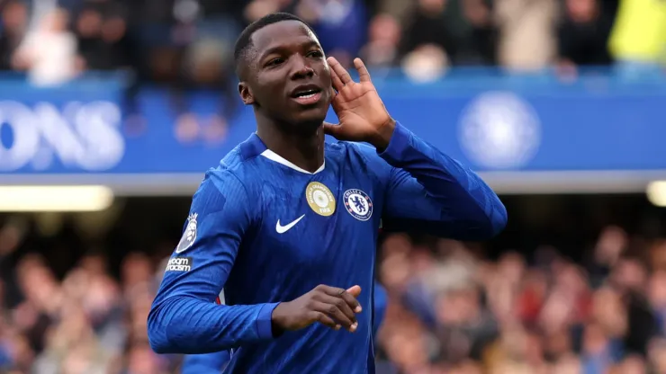 Moises Caicedo of Chelsea celebrates scoring his team's first goal during the Premier League match between Chelsea and Liverpool.