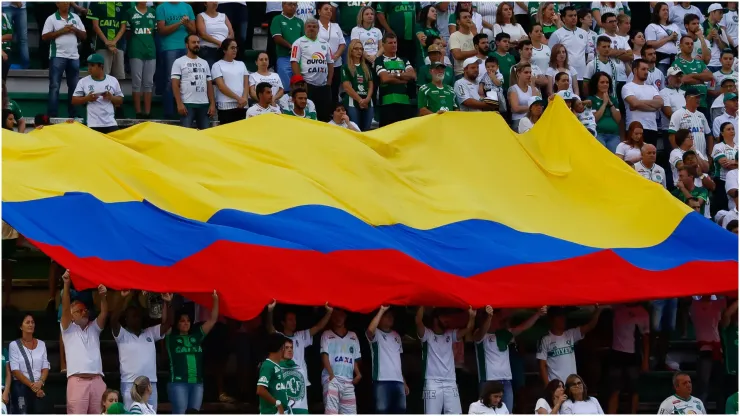 Fans with a Colombia flag 
