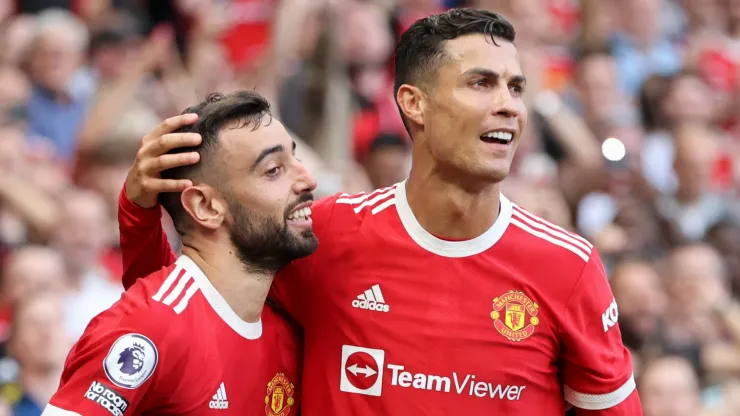 Bruno Fernandes and Cristiano Ronaldo playing for Manchester United.

