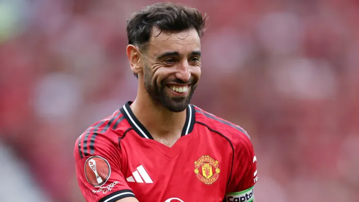 Bruno Fernandes of Manchester United smiling during a pre-season game.
