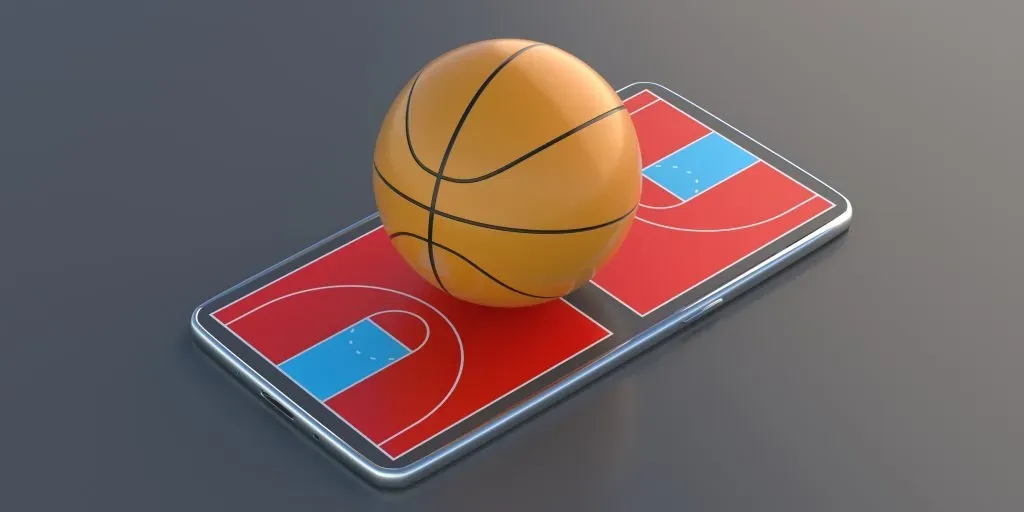 Imagem gráfica de smartphone com campo de basquete projetado na sua tela, com bola de basquete em 3d na sua superfície, representando as apostas em basquete da 1xbet.