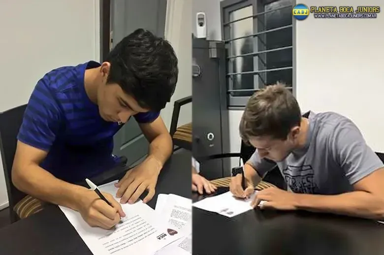 Luna Diale y Bettini firmando su contrato. Foto: Emilia Manrique.
