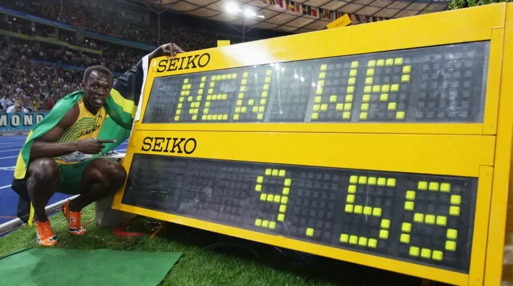 BERLIN – AUGUST 16:  Usain Bolt of Jamaica celebrates winning the gold medal in the men’s 100 Metres Final during day two of the 12th IAAF World Athletics Championships at the Olympic Stadium on August 16, 2009 in Berlin, Germany. Bolt set a new World Record of 9.58.