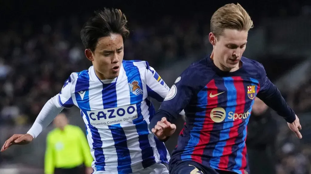 Takefusa Kubo of Real Sociedad and Frenkie de Jong of Barcelona