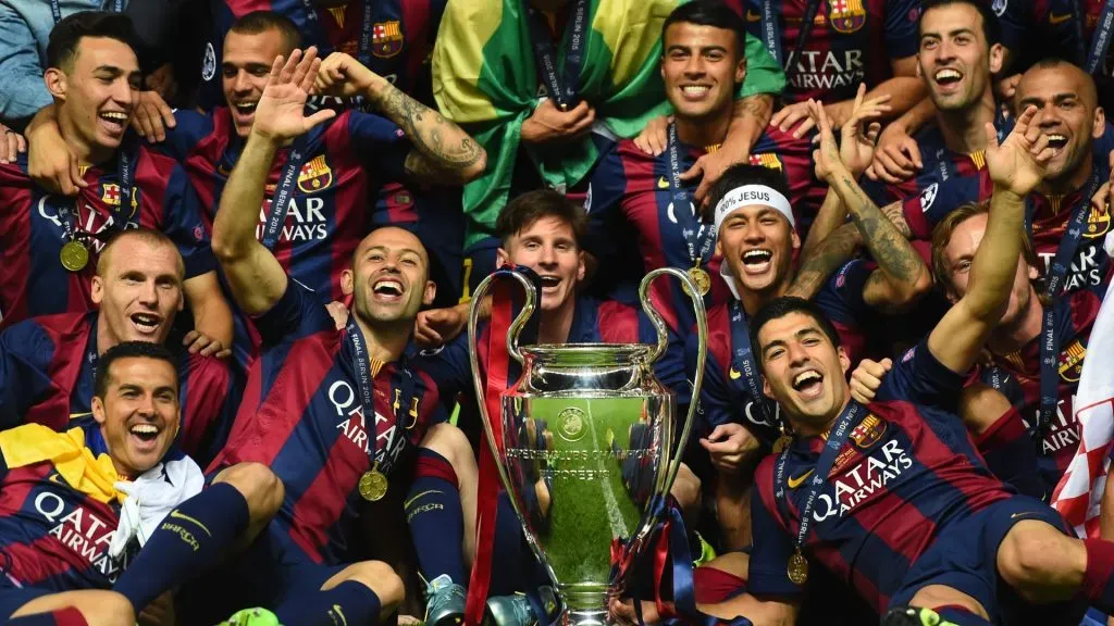 Barcelona players including Javier Mascherano, Lionel Messi, Neymar and Luis Suarez celebrate victory with the trophy after the UEFA Champions League Final in 2015. (Source: Laurence Griffiths/Getty Images)