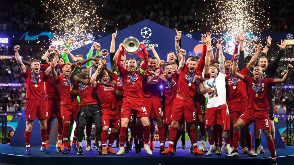 Jordan Henderson of Liverpool lifts the Champions League Trophy after winning the UEFA Champions League Final in 2019. (Source: Michael Regan/Getty Images)