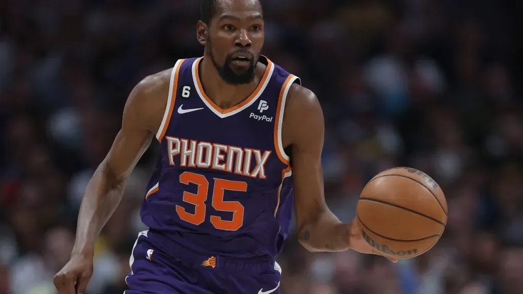DENVER, COLORADO – MAY 09:  Kevin Durant #35 of the Phoenix Suns brings the ball down the court against the Denver Nuggets in the third quarter during Game Five of the NBA Western Conference Semifinals at Ball Arena on May 09, 2023 in Denver, Colorado. (Photo by Matthew Stockman/Getty Images)