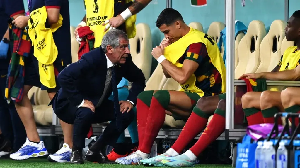 Fernando Santos speaks with Cristiano Ronaldo before a substitution during the FIFA World Cup Qatar 2022