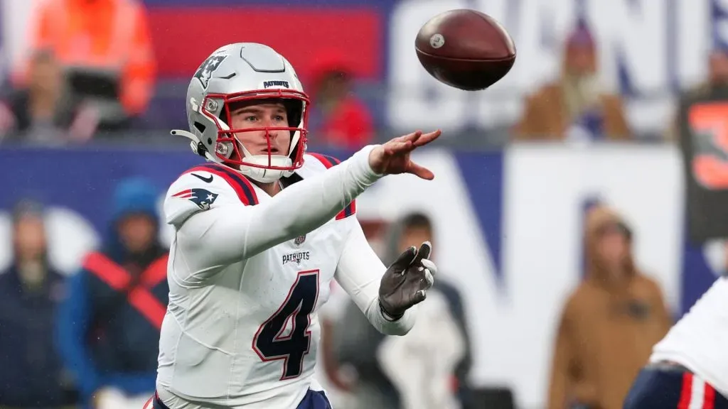 Bailey Zappe throws a pass against the New York Giants.