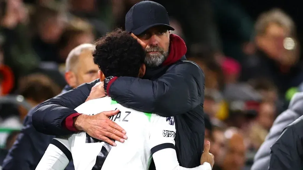 Jurgen Klopp hugs Luis Diaz during the match against Luton Town