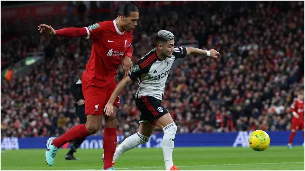 Andreas Pereira of Fulham under pressure from Virgil van Dijk of Liverpool – Clive Brunskill/Getty Images