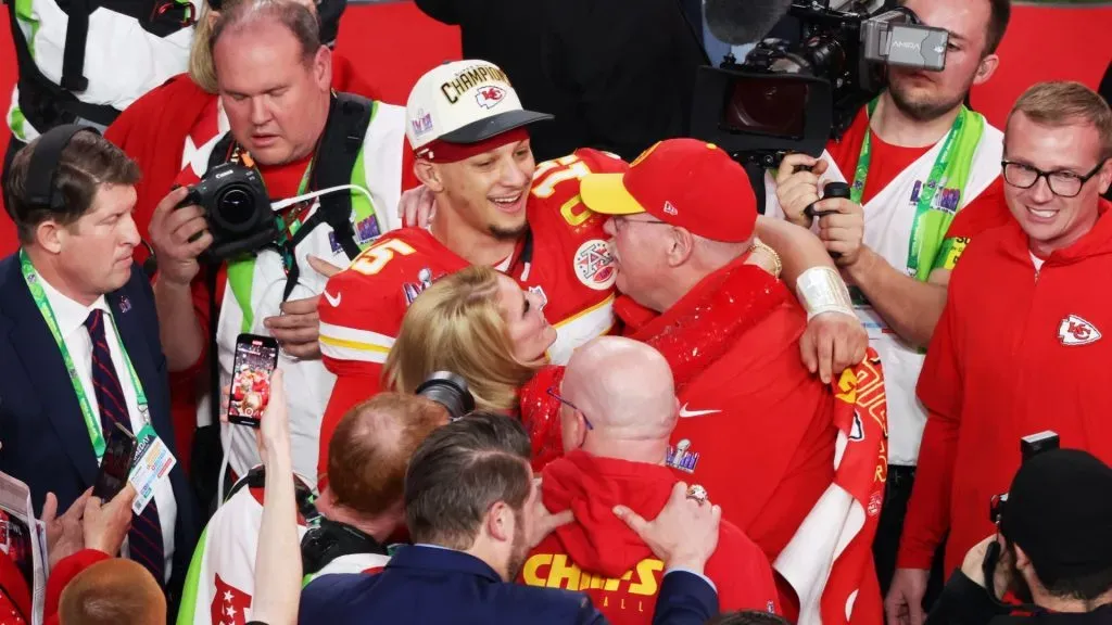 Head coach Andy Reid and Patrick Mahomes #15 of the Kansas City Chiefs embrace after after defeating the San Francisco 49ers 25-22 in overtime during Super Bowl LVIII at Allegiant Stadium on February 11, 2024 in Las Vegas, Nevada.