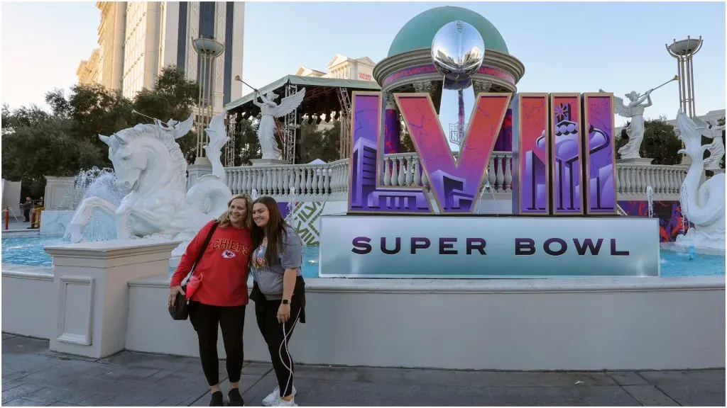 Visitors pose in front of a Super Bowl LVIII logo – Ethan Miller/Getty Images