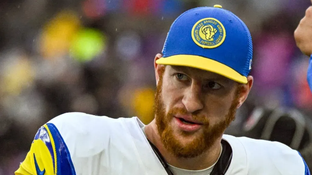 Carson Wentz looks on during a game from the sidelines.