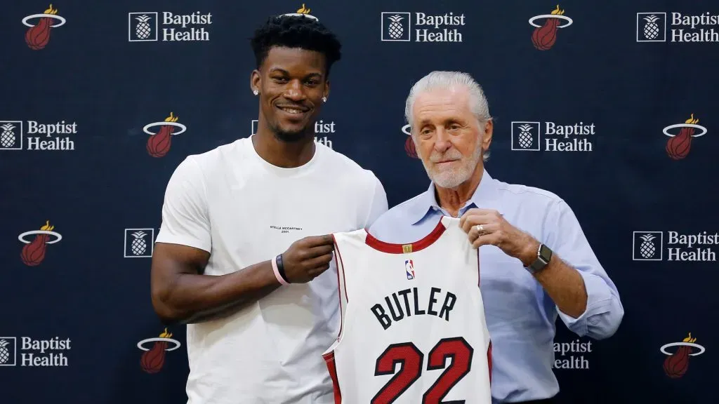 Jimmy Butler #22 of the Miami Heat poses for a photo with president Pat Riley during his introductory press conference at American Airlines Arena on September 27, 2019 in Miami, Florida.