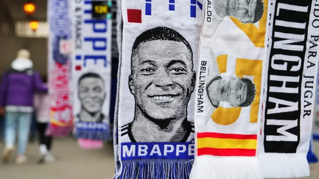 Scarves with the faces of Kylian Mbappe, Cristiano Ronaldo and Jude Bellingham are seen for sale outside the stadium prior to the LaLiga EA Sports match between Real Madrid CF and Sevilla FC at Estadio Santiago Bernabeu on February 25, 2024 in Madrid, Spain.