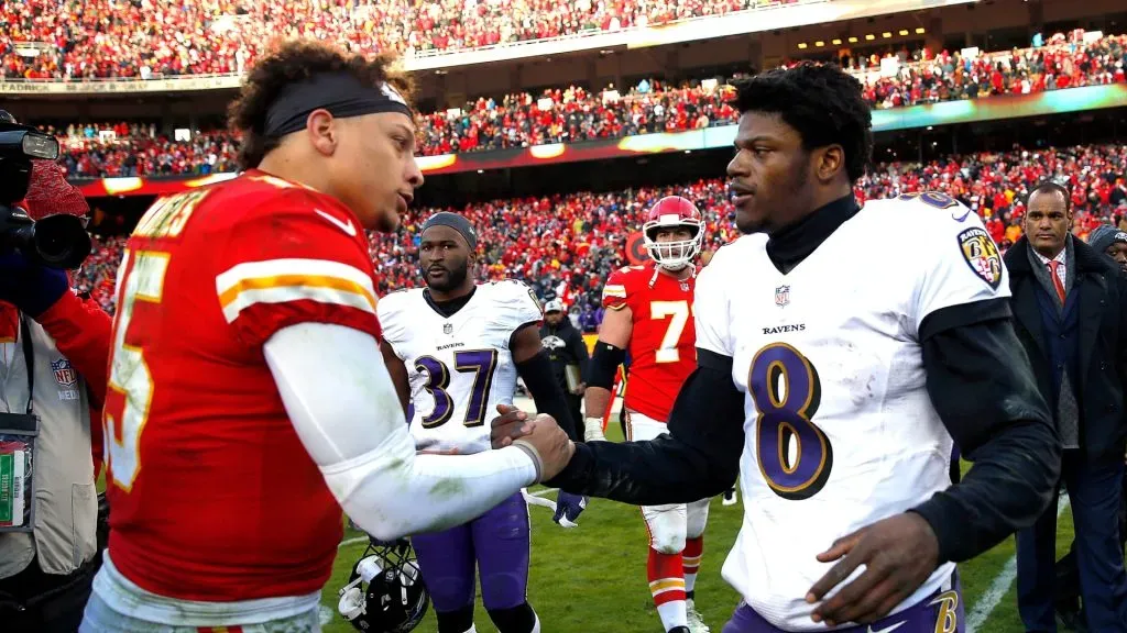 Quarterback Patrick Mahomes #15 of the Kansas City Chiefs shakes hands with quarterback Lamar Jackson #8 of the Baltimore Ravens after the Chiefs defeated the Ravens 27-24 in overtime to win the game at Arrowhead Stadium on December 09, 2018 in Kansas City, Missouri.