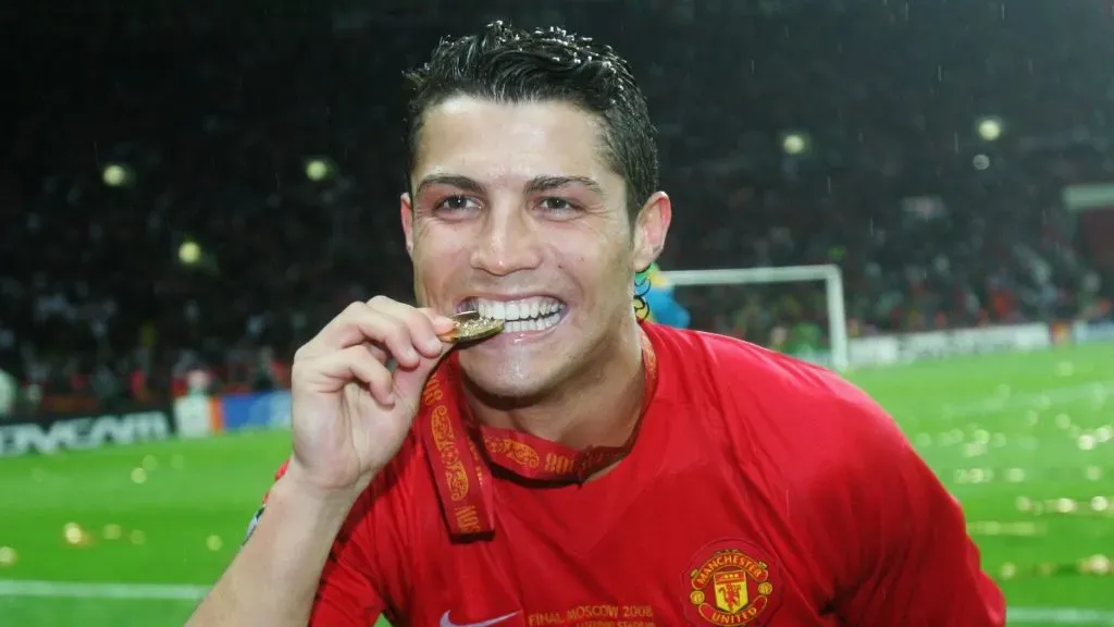 Cristiano Ronaldo of Manchester United bites his winners medal following his team’s victory during the UEFA Champions League Final match between Manchester United and Chelsea at the Luzhniki Stadium on May 21, 2008 in Moscow, Russia.
