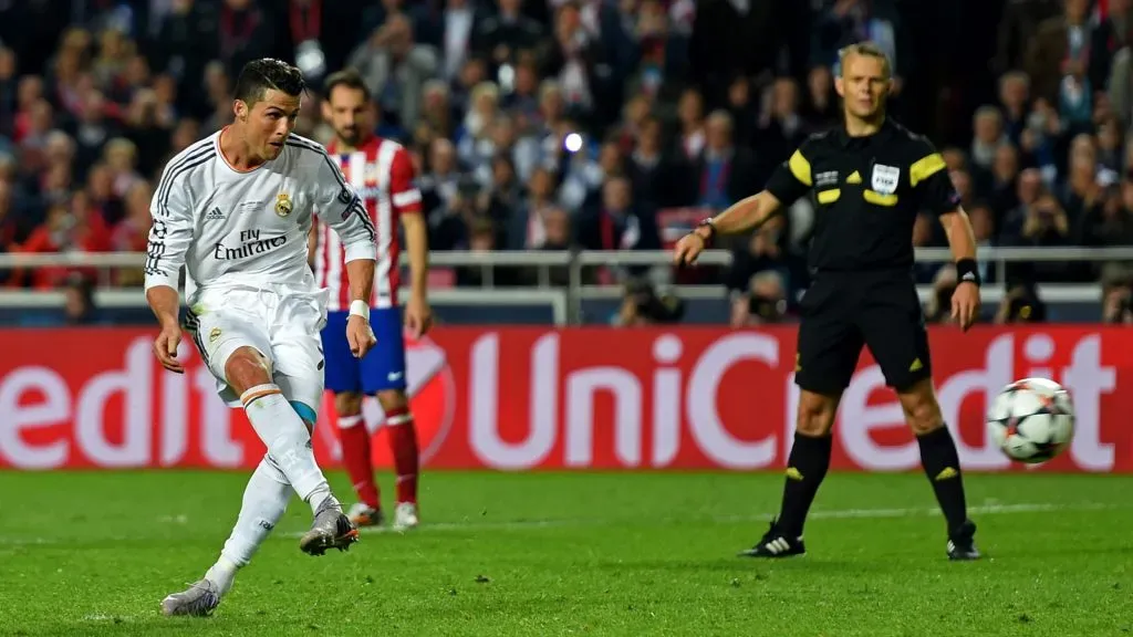 Cristiano Ronaldo of Real Madrid scores their fourth goal from penalty spot during the UEFA Champions League Final between Real Madrid and Atletico de Madrid at Estadio da Luz on May 24, 2014 in Lisbon, Portugal.