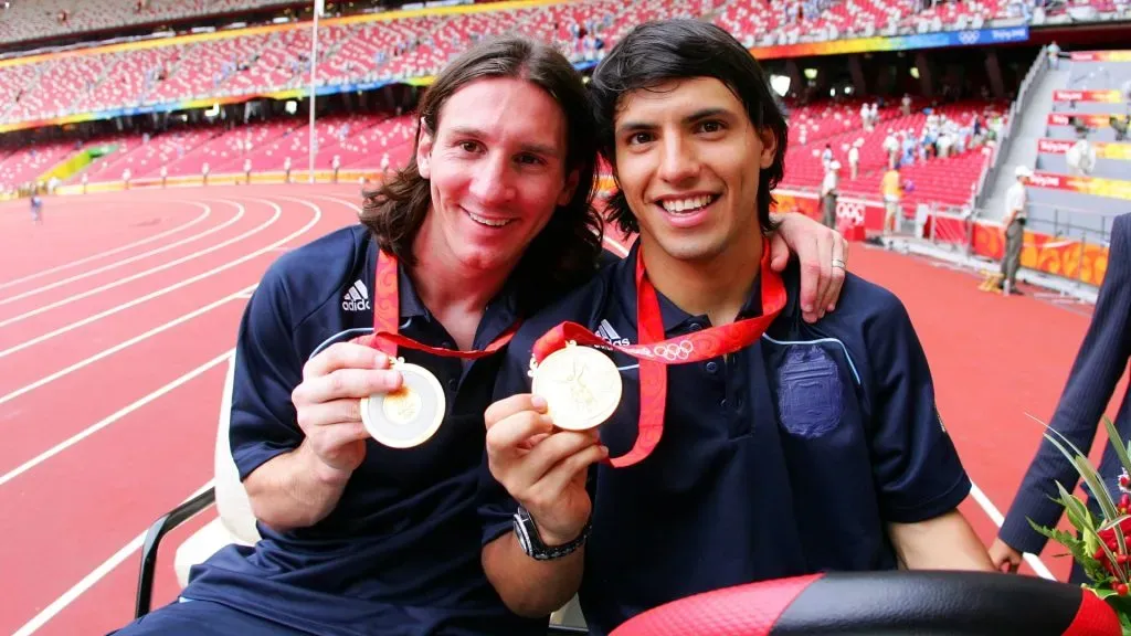 Argentinian forwards Lionel Messi (L) and Sergio Aguero gold medal pose during the men’s Olympic football tournament medal ceremony at the national stadium in Beijing during the Men’s Final between Nigeria and Argentina at the National Stadium on Day 15 of the Beijing 2008 Olympic Games on August 23, 2008 in Beijing, China.