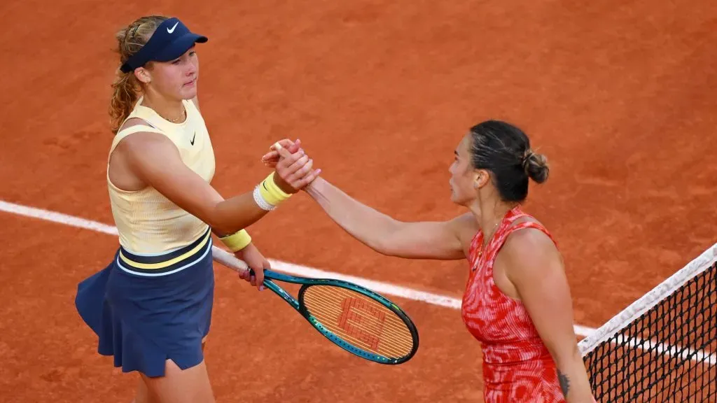 Aryna Sabalenka and Mirra Andreeva shake hands after the Women’s Singles Quarter Final match on Day 11 at Roland Garros on June 05, 2024 in Paris, France.