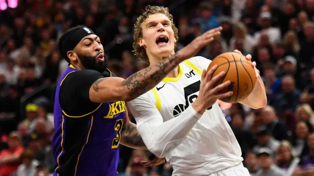 Anthony Davis #3 of the Los Angeles Lakers defends Lauri Markkanen #23 of the Utah Jazz during the first half of a game at Delta Center on January 13, 2024 in Salt Lake City, Utah.