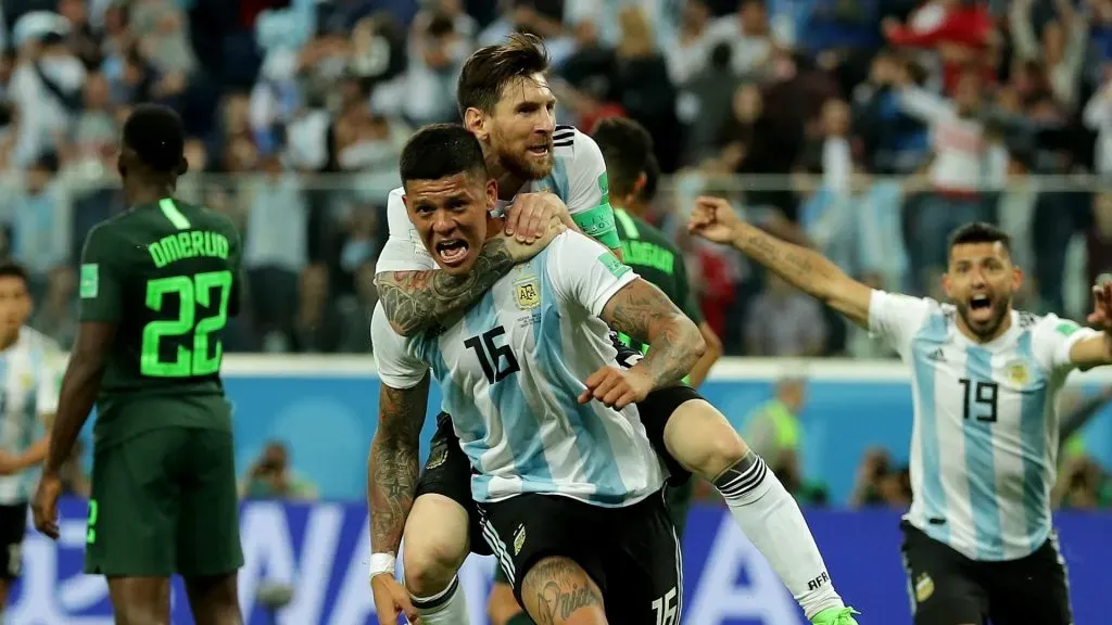 Marcos Rojo of Argentina celebrates after scoring his team's second goal with teammate Lionel Messi during the 2018 FIFA World Cup Russia group D match between Nigeria and Argentina at Saint Petersburg Stadium on June 26, 2018 in Saint Petersburg, Russia.