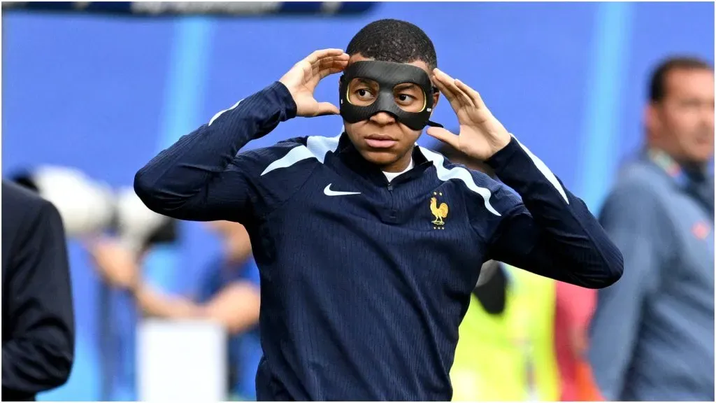 Kylian Mbappe with the mask.