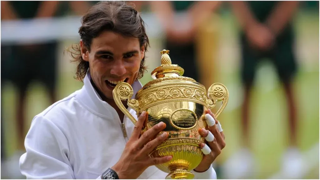 Rafael Nadal bites the Wimbledon Trophy – IMAGO / ABACAPRESS